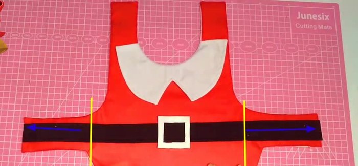 Coser la tira hasta el punto indicado en la capa para asegurarla.