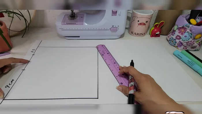 Determinar y marcar la mitad de la línea del cuello: