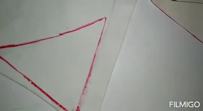 Cortar la tela según las marcas.