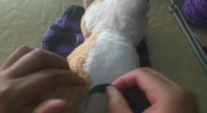 Medir la circunferencia de los bracitos (13-14cm)