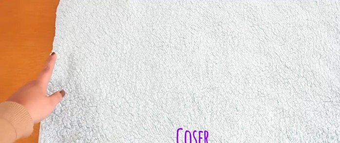 Coser una de las orillas (70cm) de la cobijita.