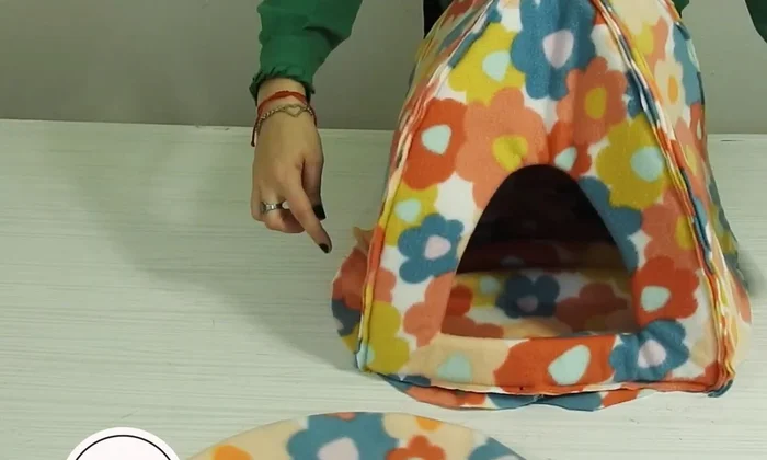 Coser la base con la máquina.