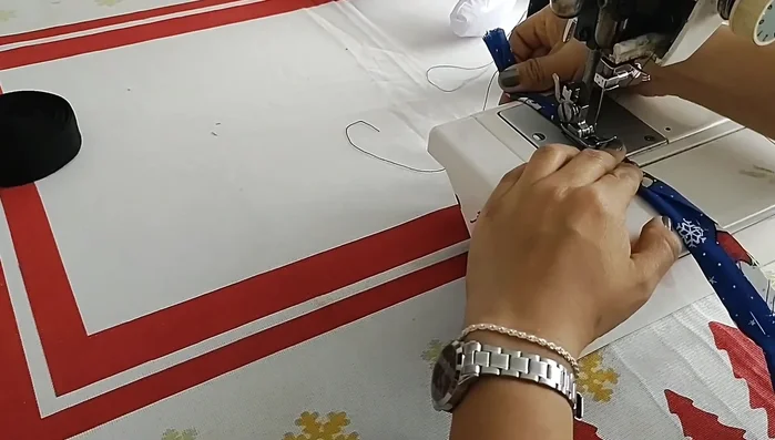 Coser la tela a la riata.