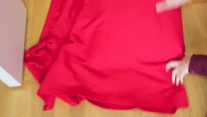 Colocar el almohadón en el centro de la manta.