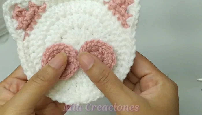 Coser las dos piezas de la boca.