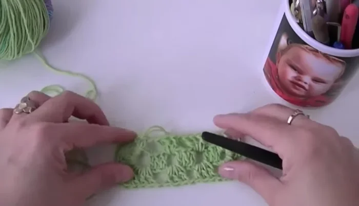 Unir la última vuelta con un punto deslizado.